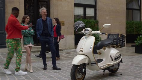 emily in paris dior scooter|vespa Dior helmet.